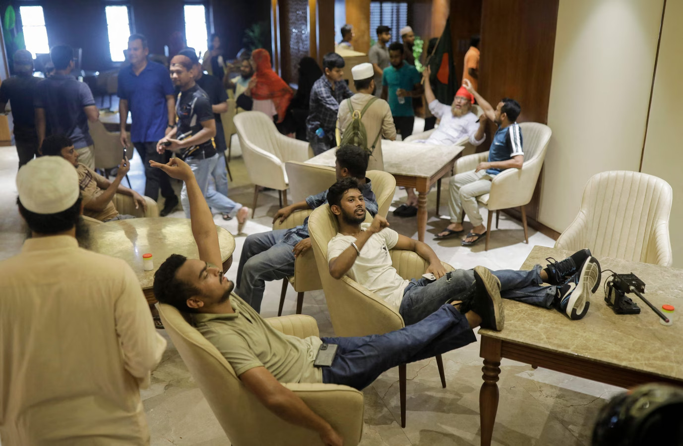 Protesters take away Dior bag, saree from ex-PM Sheikh Hasinas official residence eat biryani